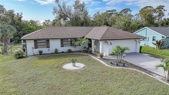 ranch-style house featuring a garage and a front yard