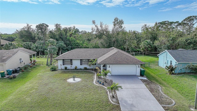 ranch-style home with a garage and a front yard