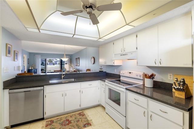 kitchen with white cabinets, stainless steel dishwasher, sink, electric range, and light tile patterned floors