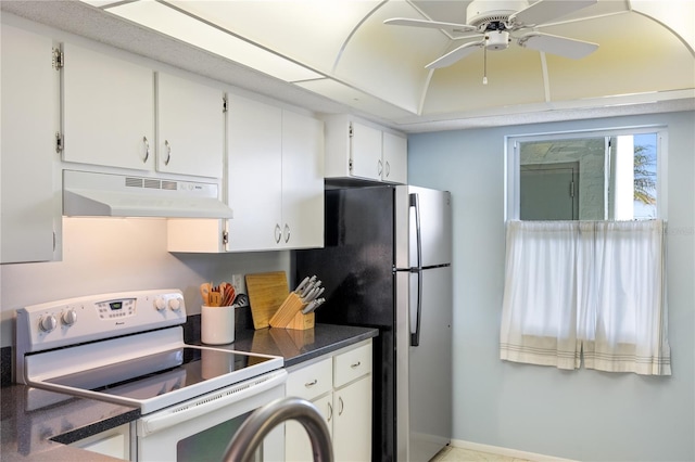 kitchen featuring ceiling fan, stainless steel refrigerator, white cabinets, and white range with electric cooktop