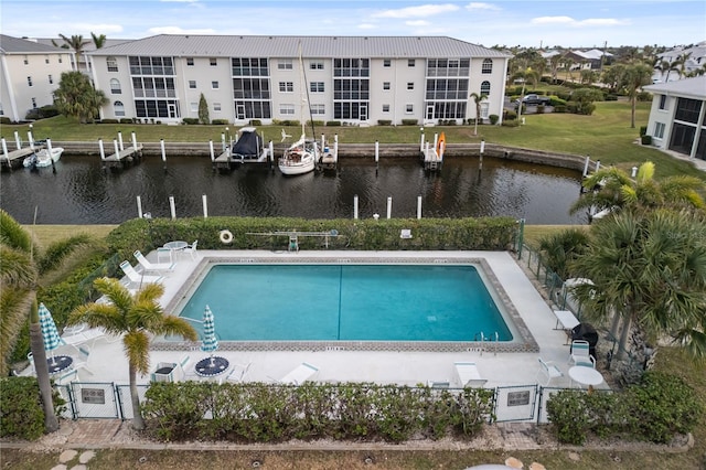 view of pool with a water view