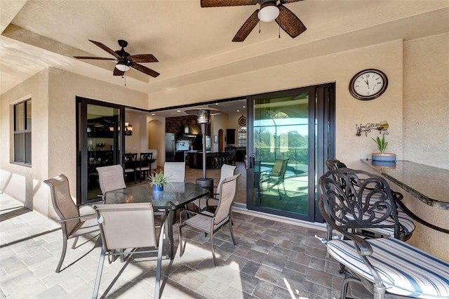 view of patio with ceiling fan