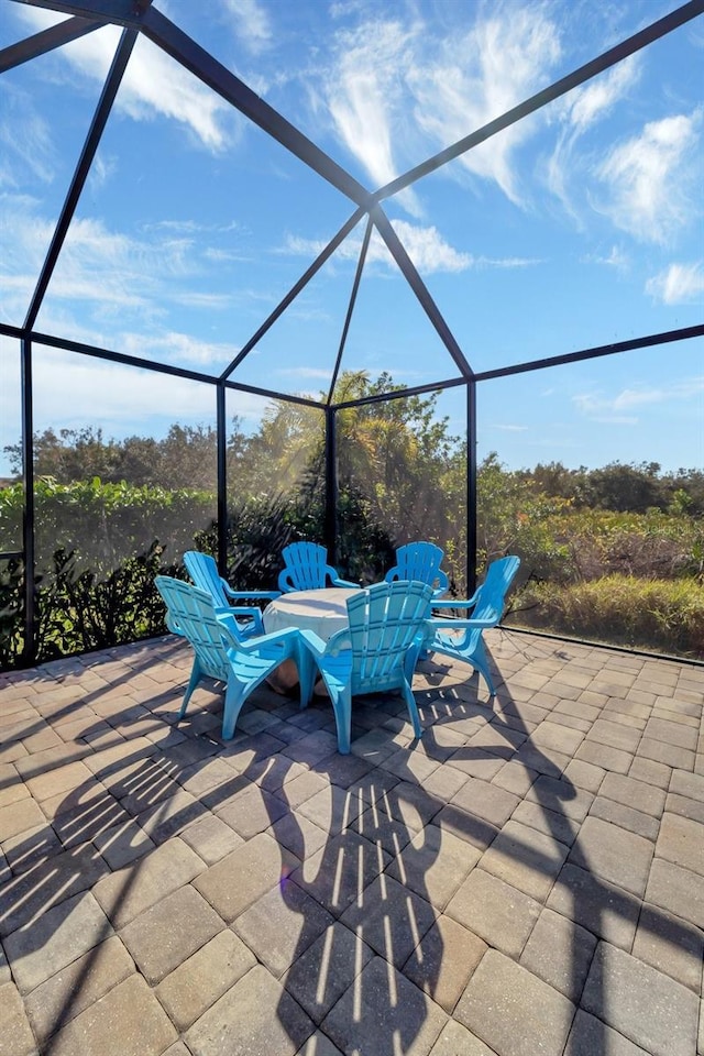 view of patio / terrace with glass enclosure