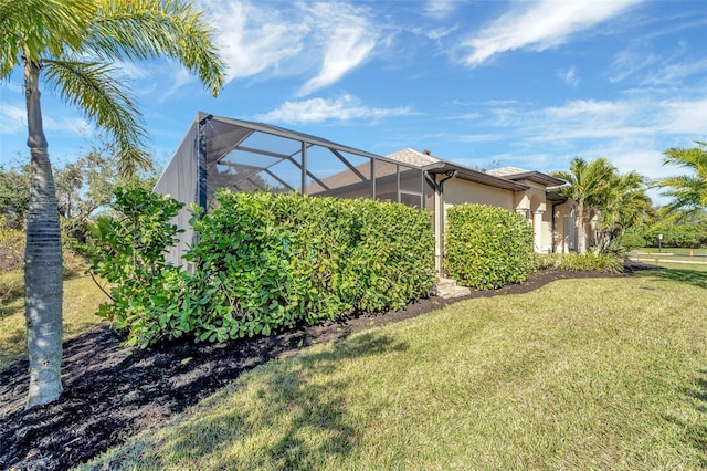 view of yard with a lanai