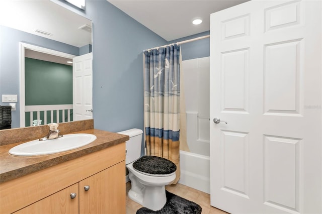 full bathroom featuring vanity, toilet, tile patterned flooring, and shower / bath combo with shower curtain