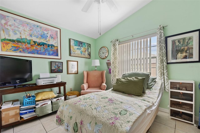 tiled bedroom with ceiling fan, lofted ceiling, and access to exterior