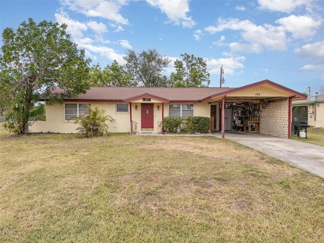 single story home featuring a carport and a front yard