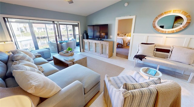 tiled living room with vaulted ceiling