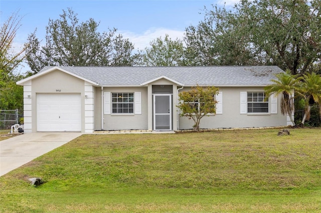 single story home with a garage, driveway, fence, a front lawn, and stucco siding