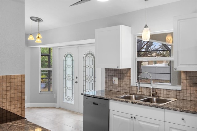 kitchen with white cabinetry, sink, hanging light fixtures, and dishwasher