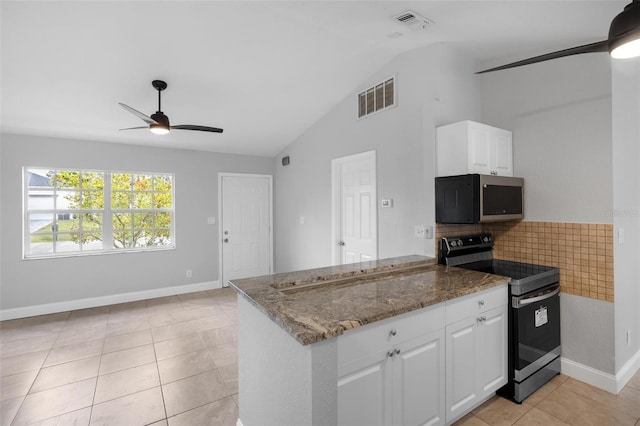 kitchen with white cabinetry, stainless steel appliances, ceiling fan, and lofted ceiling