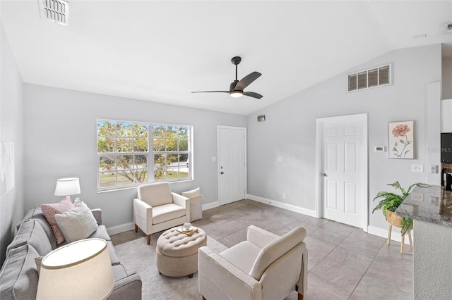 sitting room with a ceiling fan, lofted ceiling, visible vents, and baseboards