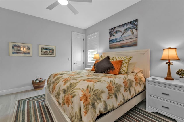 bedroom featuring ceiling fan and baseboards