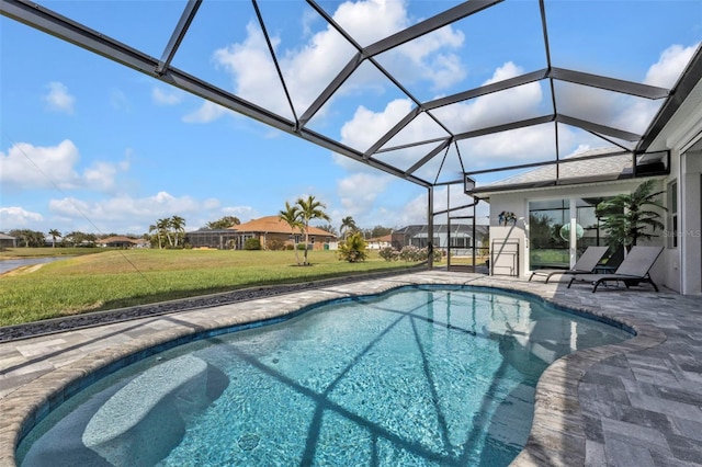 outdoor pool featuring a patio area, glass enclosure, a lawn, and a storage shed