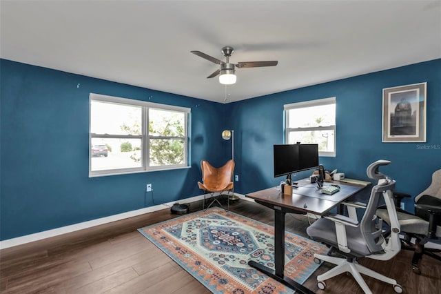 office with ceiling fan, plenty of natural light, and wood-type flooring