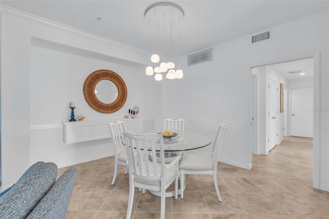 dining space featuring a chandelier