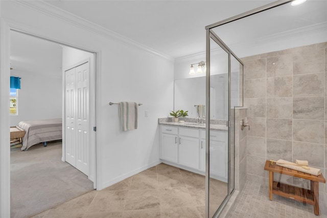 bathroom with a shower with door, ornamental molding, tile patterned flooring, and vanity