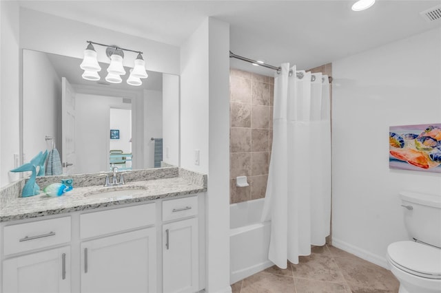 full bathroom with tile patterned floors, vanity, toilet, and shower / tub combo