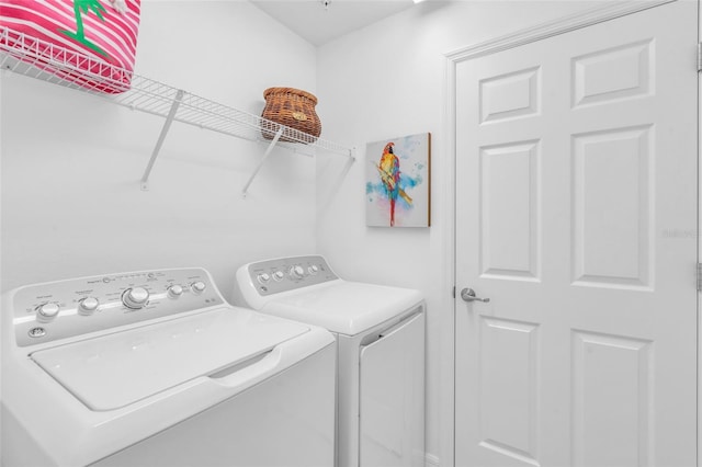 laundry area featuring separate washer and dryer