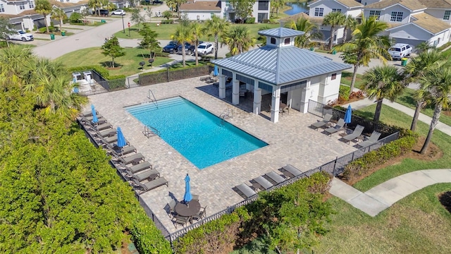 view of pool featuring a patio and a gazebo