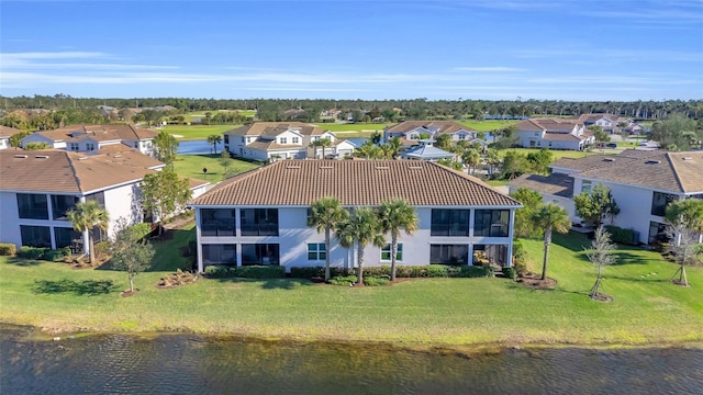 bird's eye view with a water view