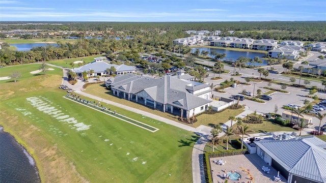 bird's eye view with a water view