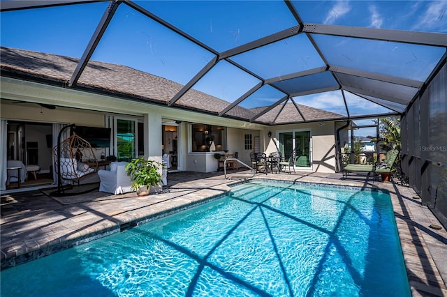 view of pool featuring a patio and a lanai