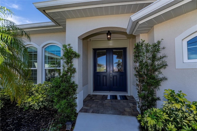 doorway to property featuring french doors