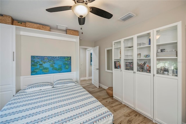 bedroom featuring ceiling fan and light hardwood / wood-style floors