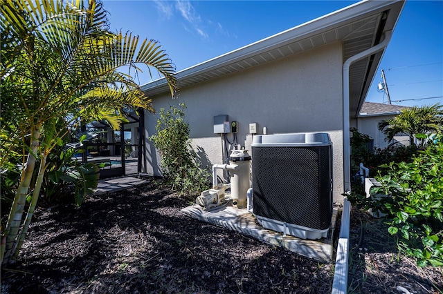 view of home's exterior featuring cooling unit