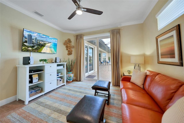 living room with crown molding and ceiling fan