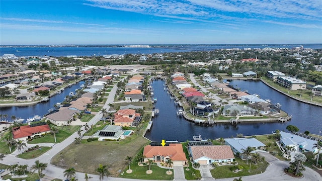 drone / aerial view with a water view