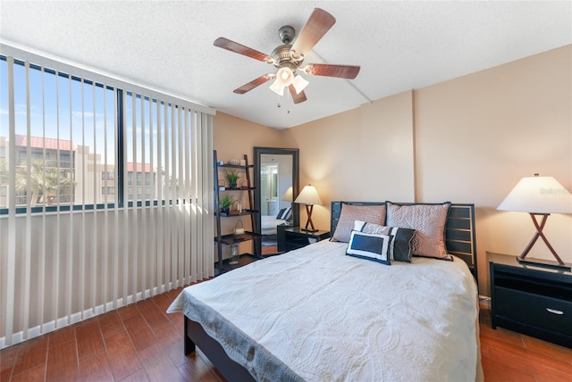 bedroom featuring hardwood / wood-style flooring and ceiling fan