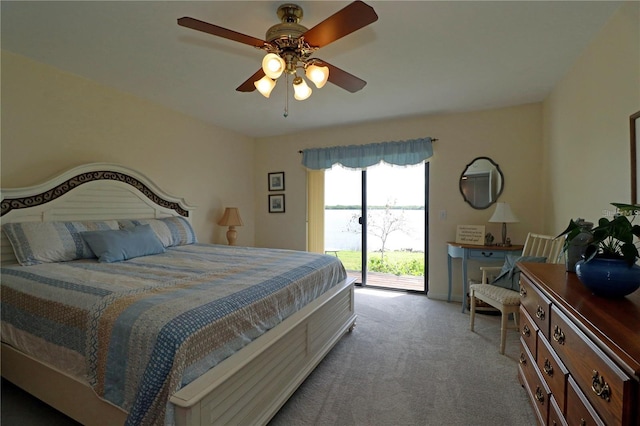 carpeted bedroom featuring access to outside and ceiling fan