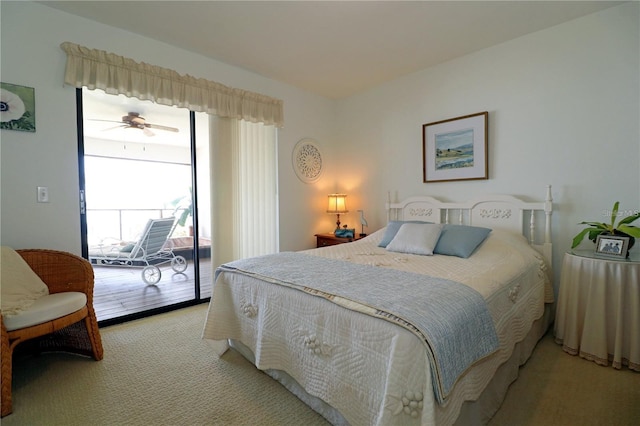 bedroom with multiple windows, light carpet, and access to exterior