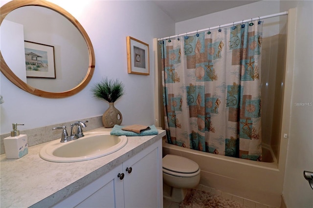 full bathroom featuring vanity, toilet, and shower / tub combo