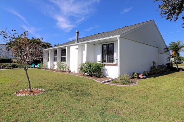 view of front of home with a front yard