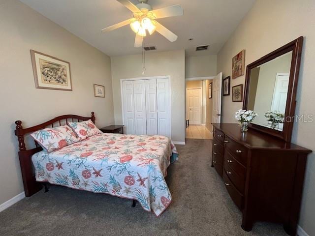 carpeted bedroom featuring ceiling fan and a closet