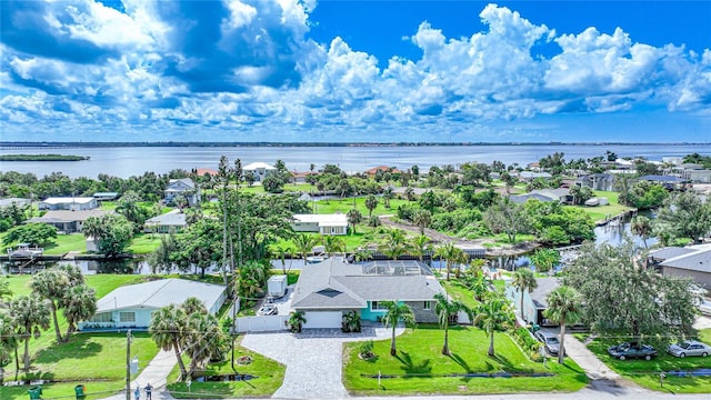 drone / aerial view with a water view