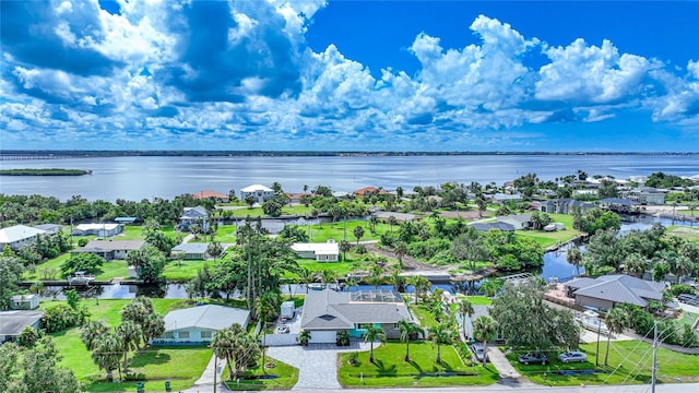 drone / aerial view with a water view