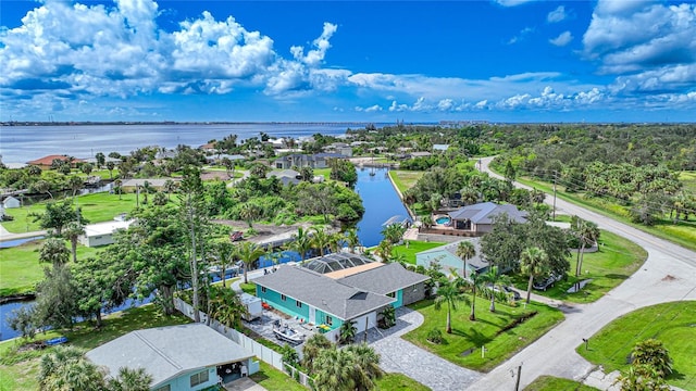 birds eye view of property featuring a water view