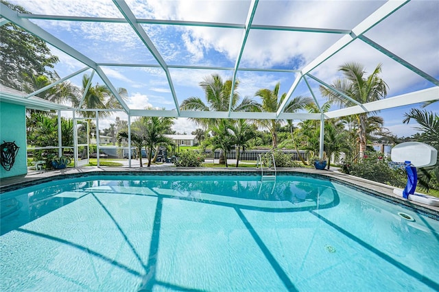 view of pool featuring a lanai