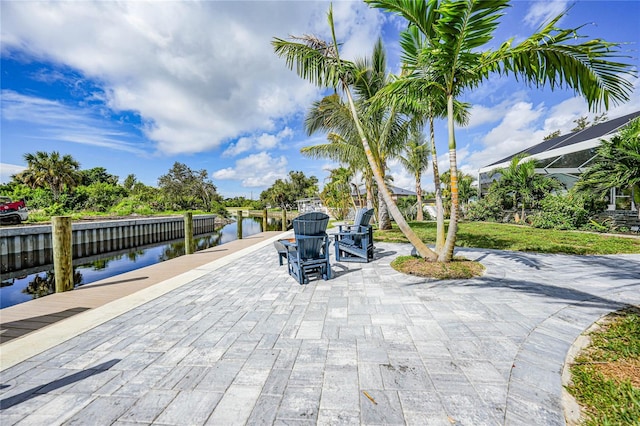 view of patio / terrace with a water view