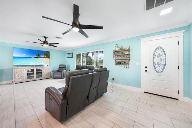 living room featuring crown molding and ceiling fan