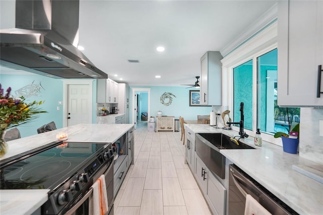 kitchen featuring sink, dishwasher, electric range, light stone countertops, and island exhaust hood