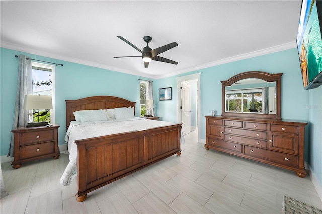 bedroom featuring ornamental molding and ceiling fan