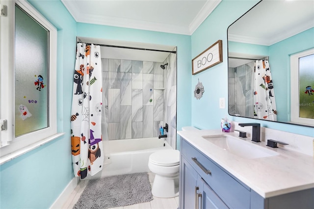 full bathroom featuring vanity, crown molding, toilet, and shower / bath combo with shower curtain