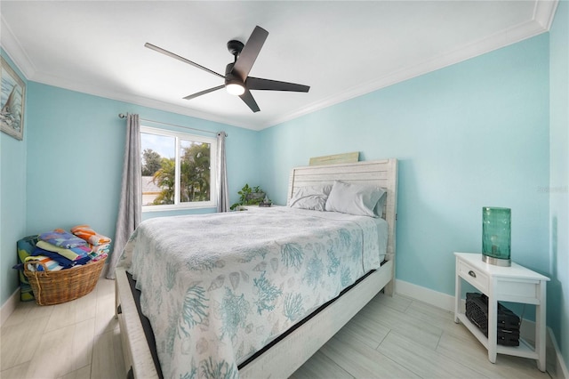 bedroom featuring ornamental molding and ceiling fan