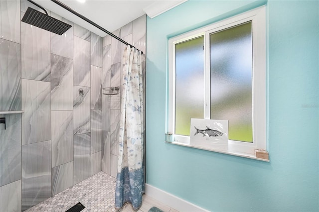 bathroom featuring curtained shower