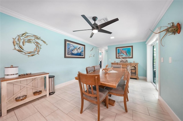 dining space featuring ornamental molding, ceiling fan, and light tile patterned flooring